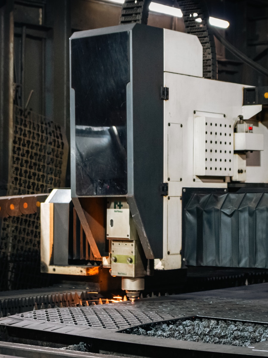 Industrial laser cutting machine working on metal